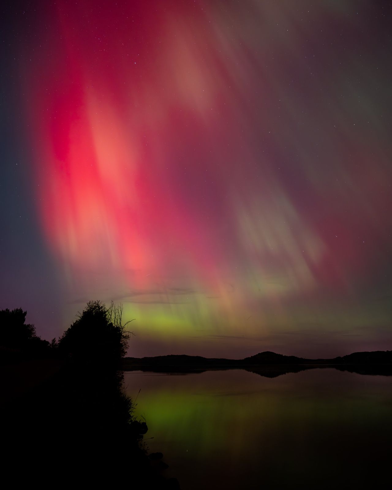 Aurora reflecting over a lake