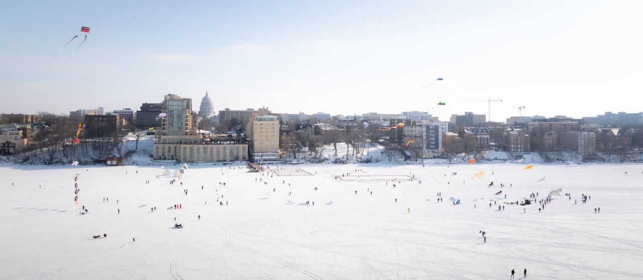 Frozen Assets festival with kites on the frozen lake